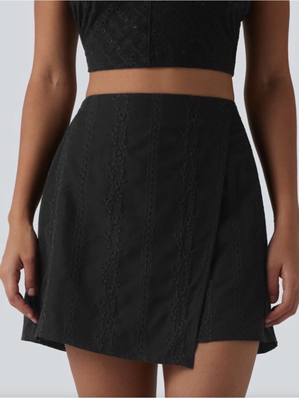 HALARA Black Mini Skirt with Subtle Lace Paneling